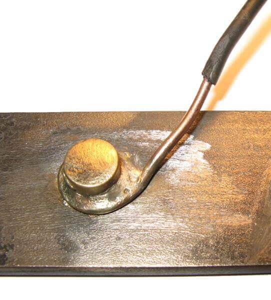 Soldered copper wire attached to metal plate
