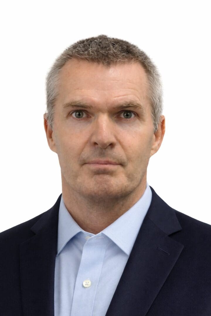 Headshot of professional man in navy suit