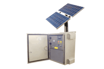 Pole-mounted solar panels with open electrical cabinet