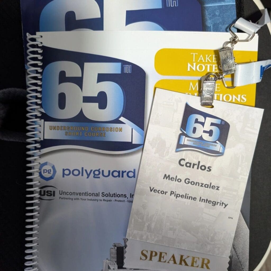 65 conference booklet and speaker badge