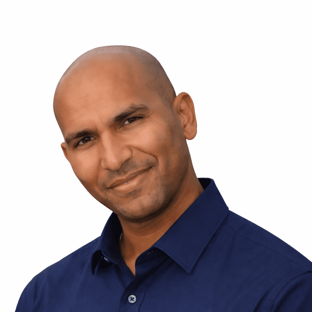 Smiling bald man in navy shirt